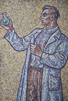 Mosaic with man in wall astronomical clock, Olomouc city - Czech republic
