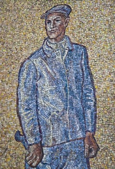 Mosaic with man in wall astronomical clock, Olomouc city - Czech republic