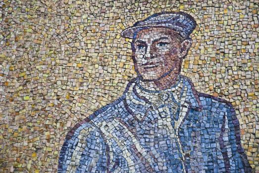 Mosaic with man in wall astronomical clock, Olomouc city - Czech republic