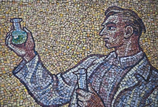 Mosaic with man in wall astronomical clock, Olomouc city - Czech republic