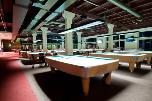 Shot of billiard room with tables, interior
