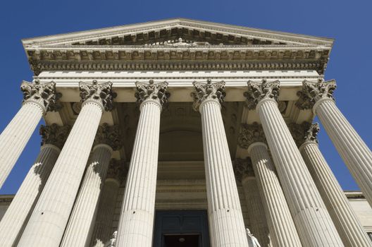 ancient courthouse against a blue sky