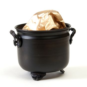 A pot of gold isolated on a white background.