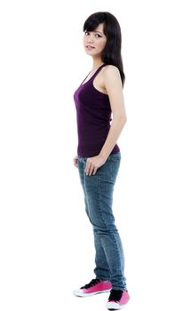 Portrait of a beautiful young woman standing against white background.