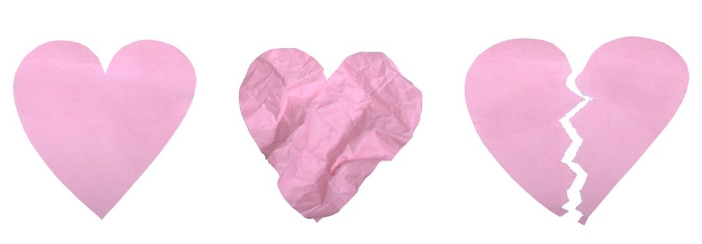 set of a pink paper heart (whole, wrinkled, broken) isolated on white background