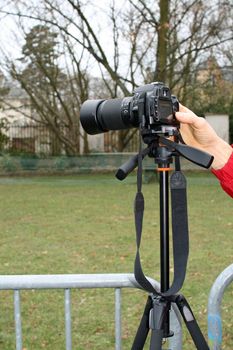 Photographer in action waiting for the beginning of the festivities