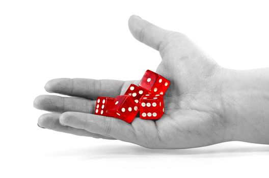 Red dices in a desturated hand