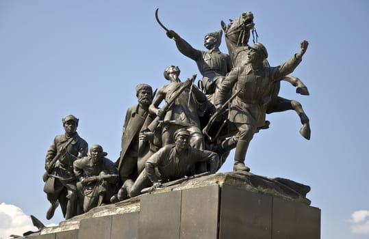 Bronze monument of V.I. Chapaev and cavalry against the blue sky. Russia. Samara 