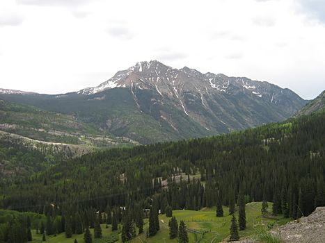 A photograph of a peaceful mountain landscape.