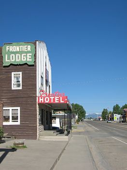 A photograph of commercial buildings in a town.