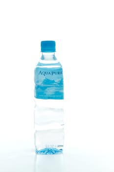 A bottle of Aqua Pura water.  Aqua Pura is owned by Bickfords Australia.