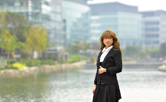 young business woman in business area