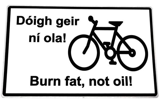 burn fat not oil irish road sign with clipping path on white