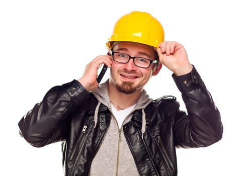 Handsome Young Man in Hard Hat Talking on Cell Phone Isolated on a White Background.