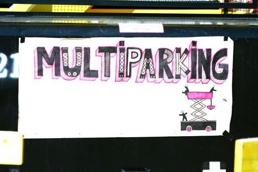 Multiparking option in Zona Tortona fashion week area during Fuorisalone, fashion and public design festival show in Milan, Italy.