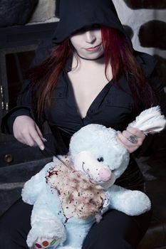 Girl decapitated stuffed bunny  
