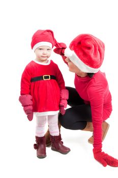 Santa mother and daughter in studio isolated
