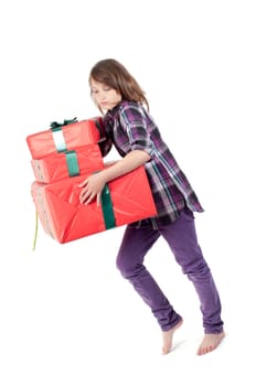 Teenager girl with presents in studio isolated on white