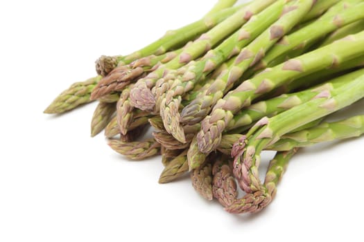 Bunch of asparagus over the white background