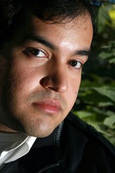 A close up of a man with leather coat