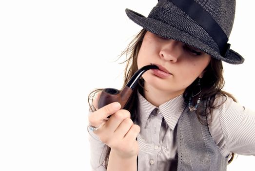 Young girl posing with pipe isolated on white 