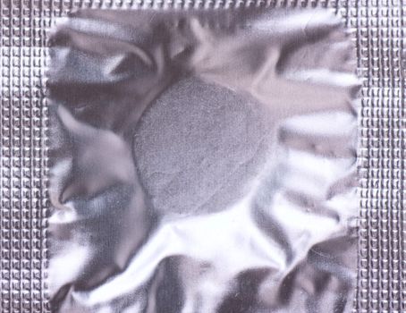 Macro view of pills pack. Relief foil packing