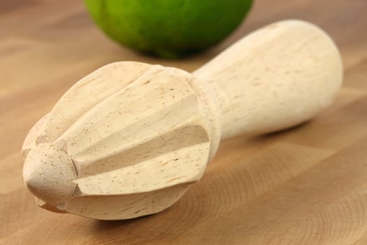 wooden lemon or citrus reamer perfect for it simplicity, durability ,ease of use and cleaning, and low cost 