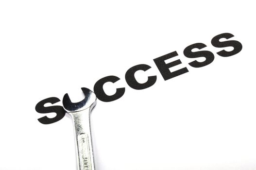 success concept with word and tool showing business growth