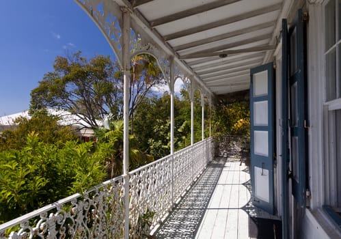 View of Charlotte Amalie in St Thomas in summer from cast iron verandah