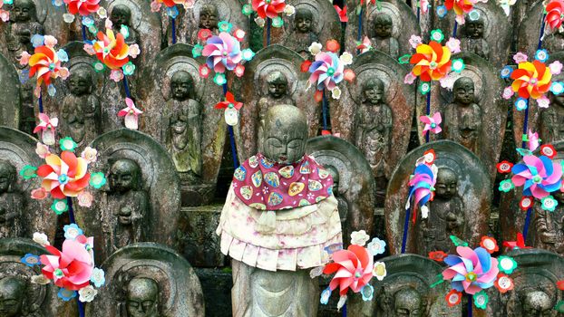 sculptures of Jizo Bodhisattva during religious festival -matsuri in Japan