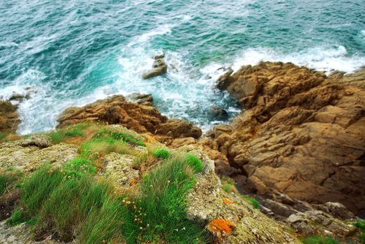 View down the cliffs at Atlantic ocean coast in Brittany, France