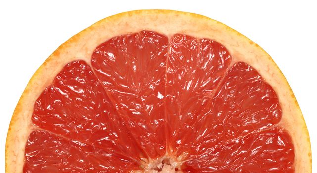 A closeup background image of half a juicy pink grapefruit.
