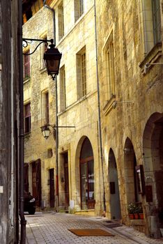 Narrow medieval street in town of Perigueux, Perigord, France