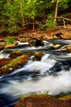 Rocky river rapids in wilderness in Ontario, Canada.
