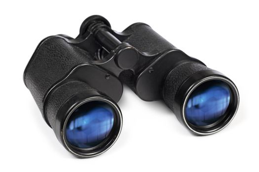 Photo of an isolated pair of old binoculars.  Clipping path included.  Some scratches and small paint chips are visible on glasses.