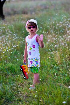 people series: little girl play the game on the field