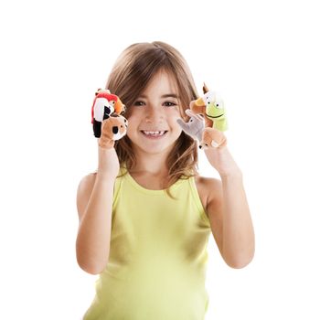 Cute and happy girl playing with finger puppets