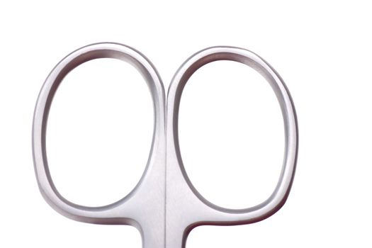 Macro view of handle of scissors isolated over white