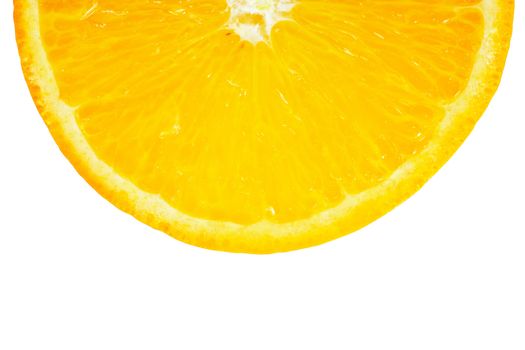 Section of orange isolated over white. Closeup view.