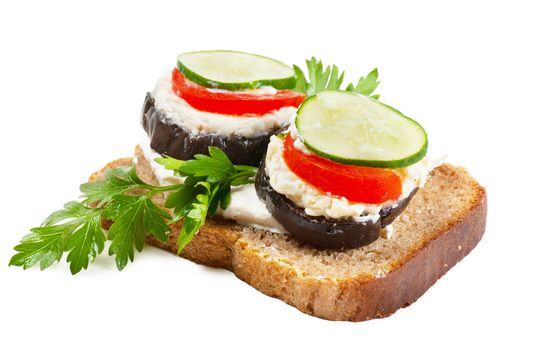 Open sandwich with aubergine and cucumbers over white background
