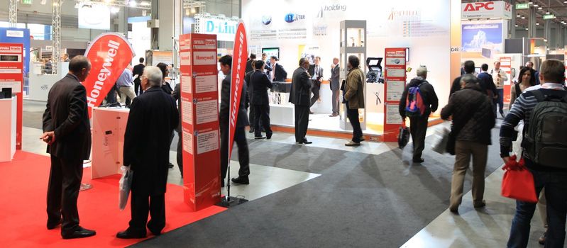 People visit technologies exhibition area at SMAU, international tradeshow of business intelligence and information technology October in Milan, Italy.