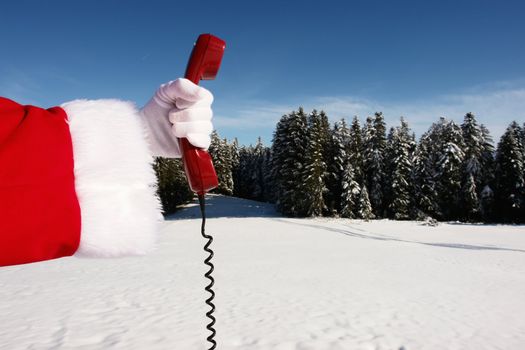 Santa Claus Hotline symbolized by a red retro phone