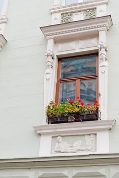 Facade of a building with windows. The building is constructed 1850-1890