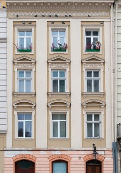 Facade of a building with windows. The building is constructed 1850-1890