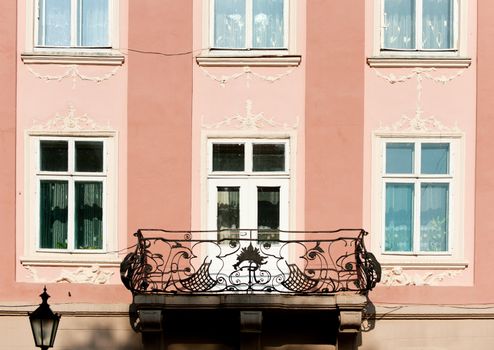 Facade of a building with a balcony. The building is constructed 1850-1890