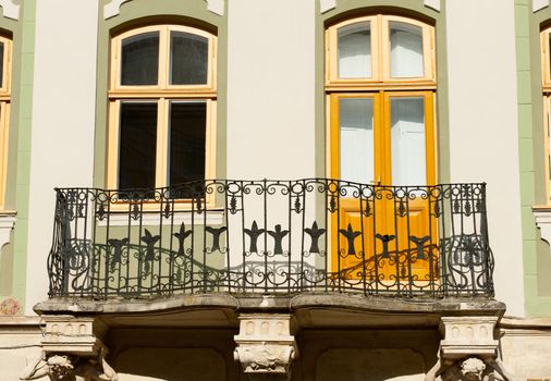 Facade of a building with a balcony. The building is constructed 1850-1890