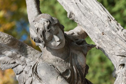 Tombstone an angel with a cross. Since its creation in 1787 Lychakiv Cemetery Lvov, Ukraine.