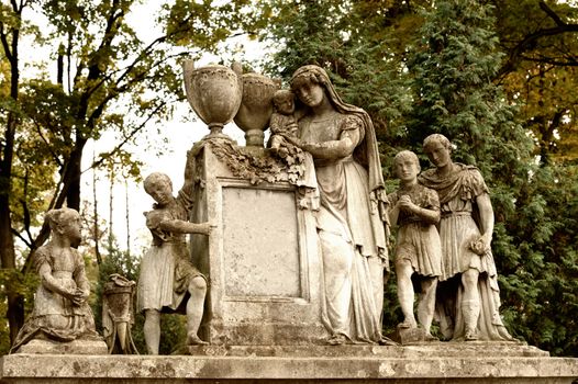 Tombstone family on a cemetery. Since its creation in 1787 Lychakiv Cemetery Lvov, Ukraine.