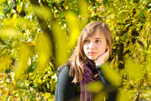 Portrait of young beautiful woman outdoors