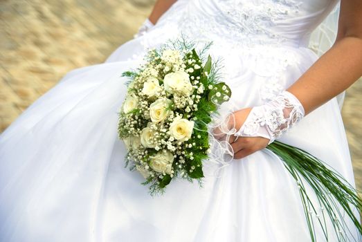 Bridal bouquet in the hand of bride